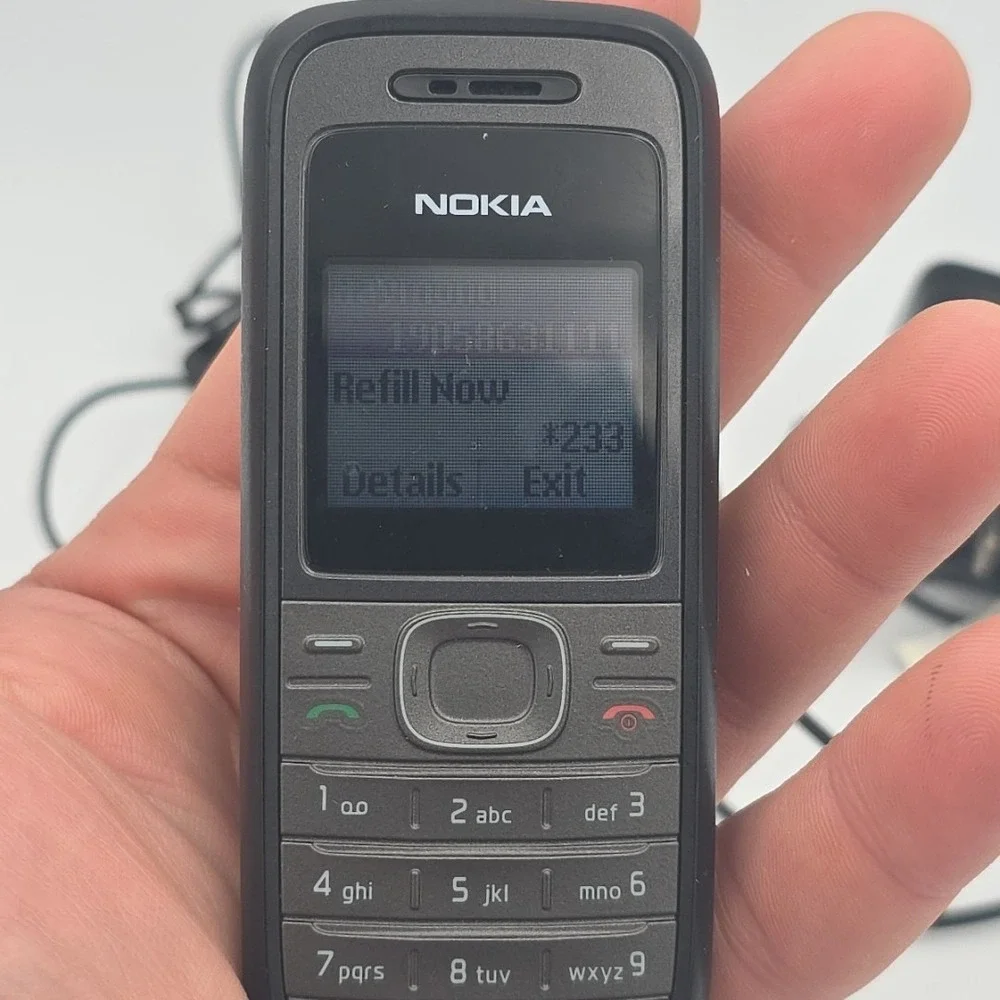 Nokia Cell Phone Model 1208 T-Mobile With Charger And Ear Buds